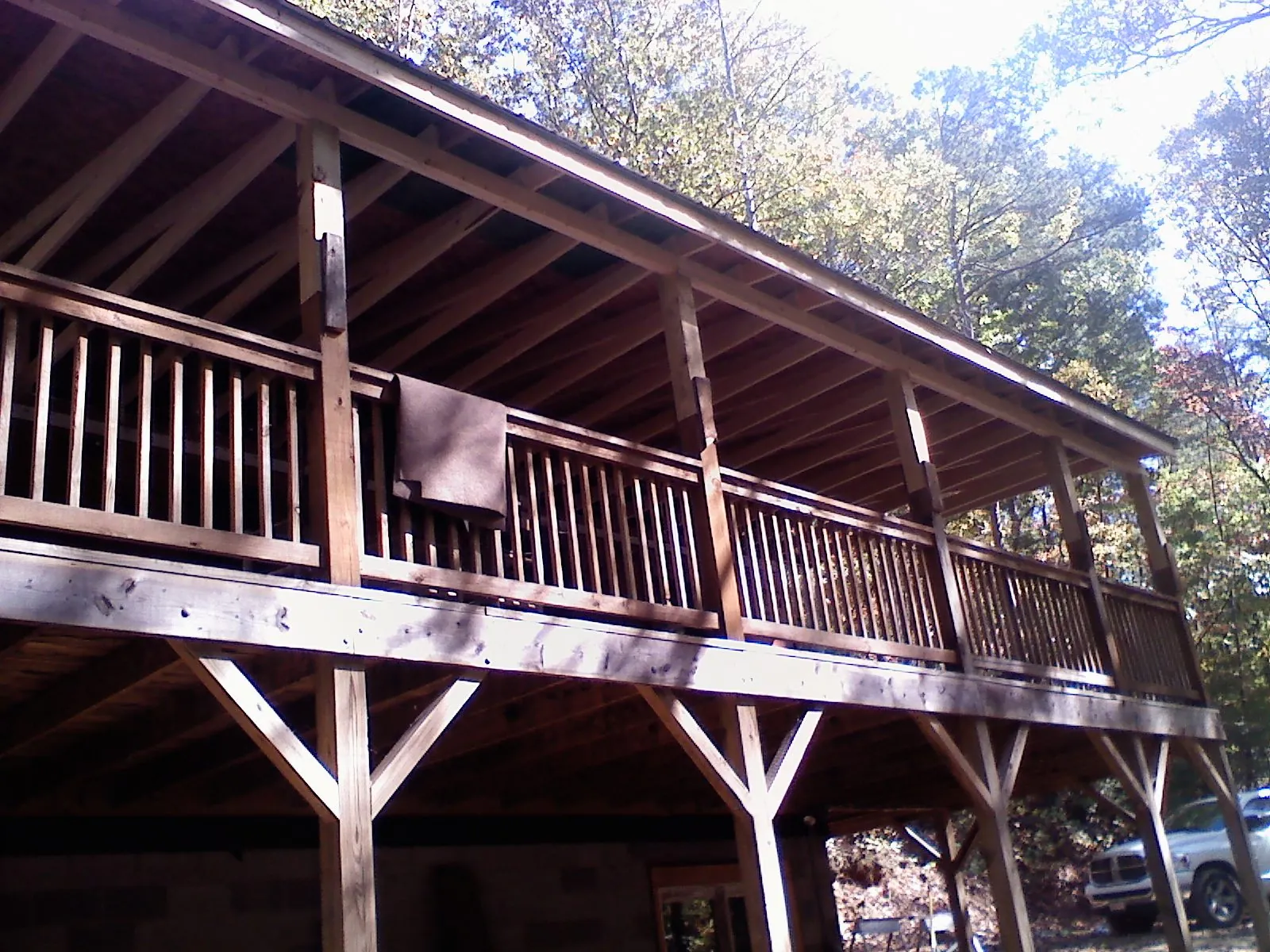 Timber framing under a new elevated porch and deck — Roof Leak Repair in Pratt by Roofing Brothers